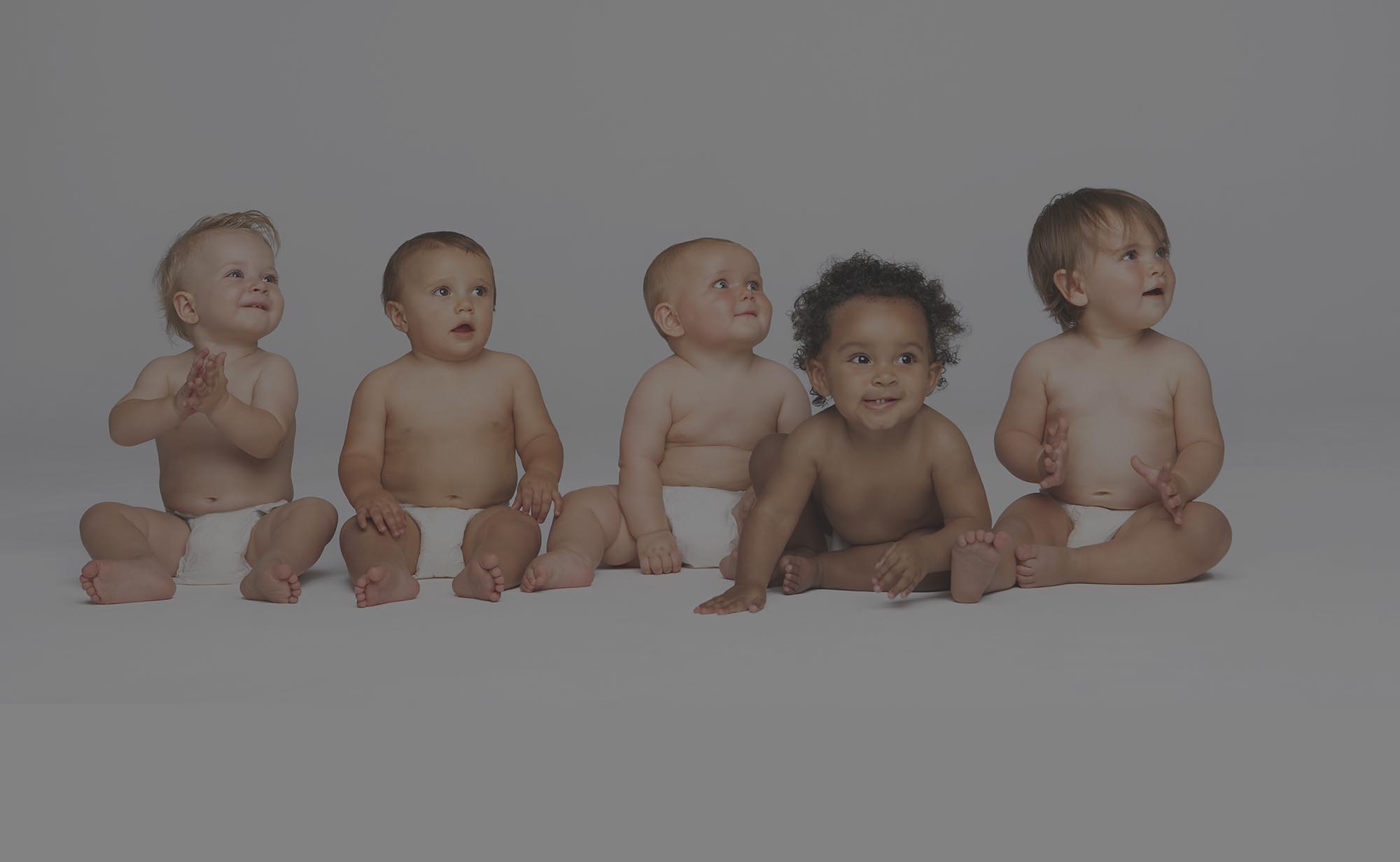 Austin pediatric chiropracti clinic, pciture of 5 cute babies in diapers